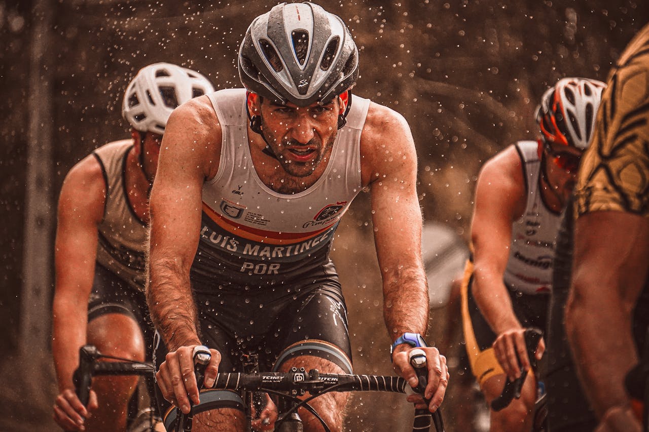 Services Determined athletes compete in a rain-soaked cycling race, pushing through with endurance.